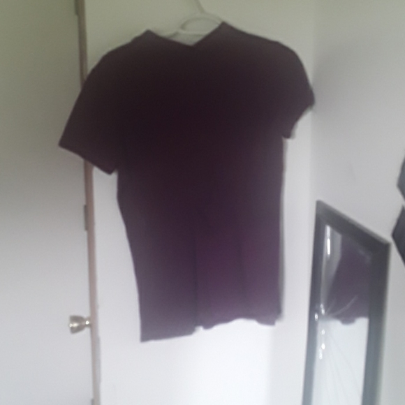 A butten up shirt - Picture 2 of 2